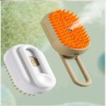 Electric steam brush for massaging and cleaning dog and cat hair